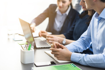Professional business team working together at desk