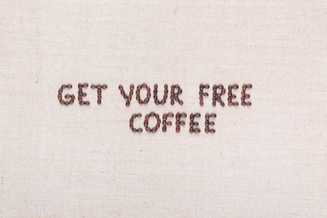 The message Get your free coffee written with coffee beans, aligned in the center.