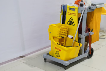 Closeup of janitorial, cleaning equipment and tools for floor cleaning.