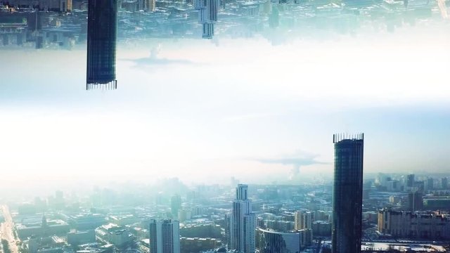 Modern city with mirror effect. Stock footage. Abstract animation with effect of parallel reality of reflected metropolis. Top view of city panorama mirrored from above like parallel worlds