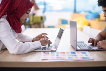 black muslim business woman ,working on laptop computer