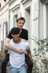 Fashion portrait of young handsome man young LGBT couple.