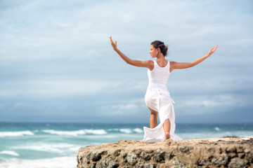 woman meditating and doing yoga
