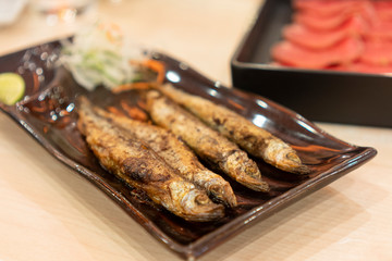 shishamo grilled placed in a plate.