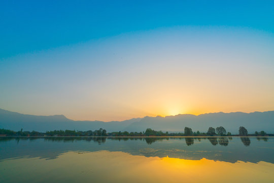 Sunrise on Dal lake, Kashmir India .