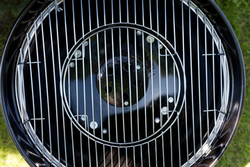 Close-up of the new grill grate from round barbecue grill