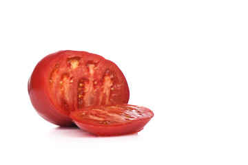 Large ripe tomato isolated on white background. Sliced tomato, a slice of tomato.