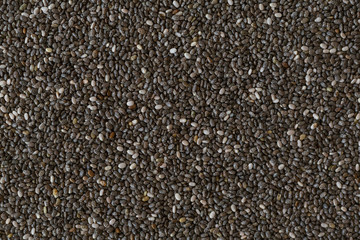 Chia seeds as texture background. Healthy superfood. Close-up of Chia seeds,  space for text. 
