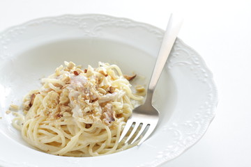 Italian food, bacon and walnut cream spaghetti