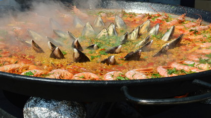 Close-up of paella being cooked outdoors