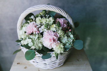 Beautiful bouquet of flowers in a basket