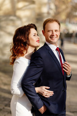 Bride and Groom on Wedding Day in city.