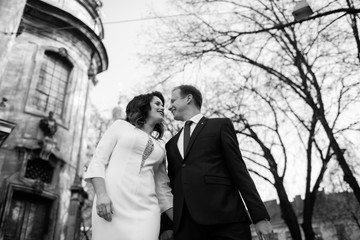 Bride and Groom on Wedding Day in city.