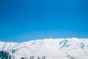 Beautiful  snow covered mountains landscape Kashmir state, India .