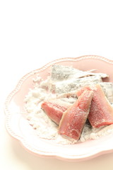 prepared pacific saury and corn starch for cooking image