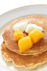 Frozen mango on panccake with copy space