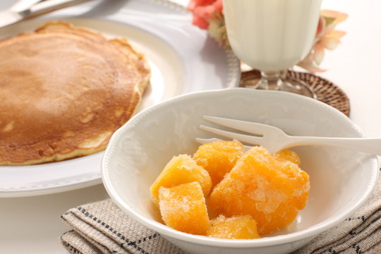 Frozen mango on bowl fro healthy breakfast image