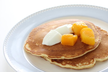 Frozen mango on panccake with copy space