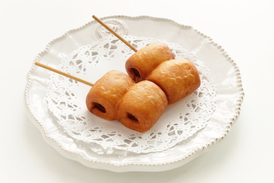 Corn dog on dish with copy space