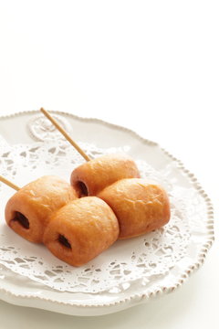 Corn dog on dish with copy space