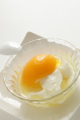 Chinese dessert, peach and almond tofu on glass bowl