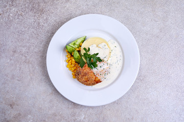 chicken with mashed potato and sauce