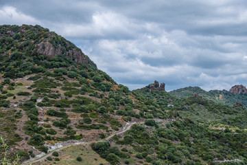 Fototapeta na wymiar Mountain ranges surrounding Bosa, province of Oristano, a picturesque village of ancient origins, Sardinia, Italy.