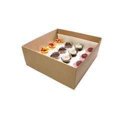 Collection of take away kraft boxes with  different desserts on white background, top view.