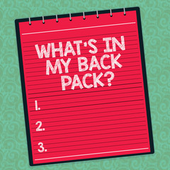 Word writing text What S Is In My Back Pack. Business concept for Things that are inside your school or travel bag Lined Spiral Top Color Notepad photo on Watermark Printed Background