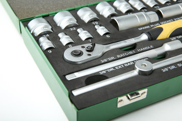background of a set of socket wrenches in the tool box. 