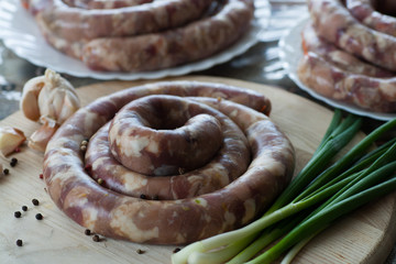 delicious juicy delicious home-made sausage raw for cooking