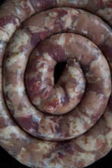 delicious juicy delicious home-made sausage raw for cooking