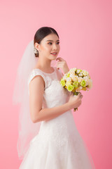 Beautiful asian bride portrait in pink studio