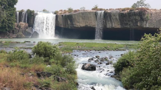 Beautiful waterfalls in Vietnam in the wild. slow motion. Asian nature. Dray Nur waterfall.