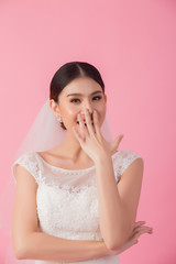 Beautiful asian bride portrait in pink studio - 270768630