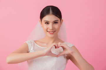 Beautiful asian bride portrait in pink studio - 270768657