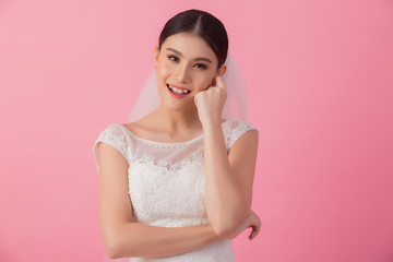 Beautiful asian bride portrait in pink studio - 270768688