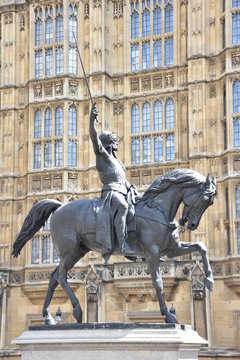 Statue of King Richard I or Richard the Lionheart outside the Houses of Parliament Westminster London England. King of England from 6 July 1189 until his death.