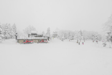 Ski lift over snow mountain in ski resort .