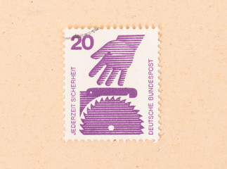 GERMANY - CIRCA 1970: A stamp printed in Germany shows safety in the construction industry, circa 1970