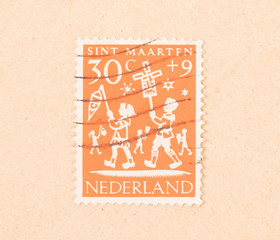 THE NETHERLANDS 1960: A stamp printed in the Netherlands shows the dutch holiday of Sint Maarten, circa 1960
