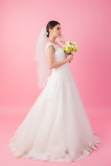 Beautiful asian bride portrait in pink studio - 270771090