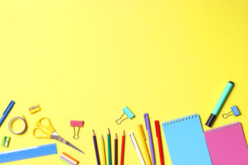 Fototapeta premium School office on a colored background top view. Office office, student office. Concept back to school. place for text. Flatlay