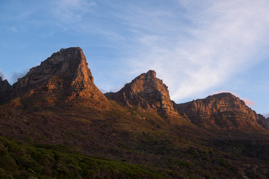 Sunset on a few of the twelve apostles seen from Chapman’s Peak Drive near Cape Town, South Africa