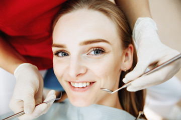 Dentist examining a patient's teeth in the dentist.