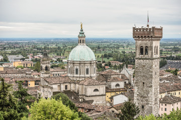 Fototapeta na wymiar Lonato del Garda, Italy - View on the old town from the rocca with the Basilica of San Giovanni Battista and the civic Tower