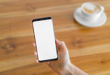 Business hand with mobile phone .