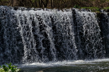 View closeup of waterfall part at cascade of river Bistritsa between village  Bistritsa and village Pancharevo, place for tourism and travel in Vitosha mountain,  Bulgaria  