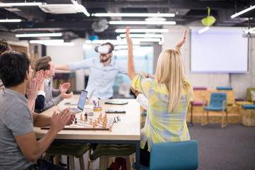 Fototapeta na wymiar Young Multiethnic Business team using virtual reality headset