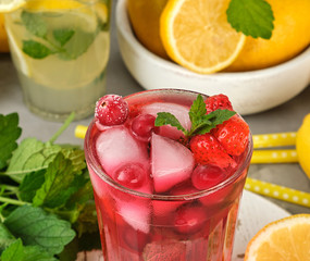 red strawberry lemonade in a glass